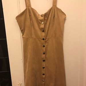 A tan button down dress.